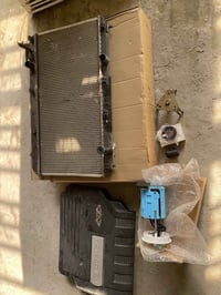 عندي أغراض مستخدمه + جديده راديترمستخدمه بيها قزان كفر محرك 2000+قبق ب...