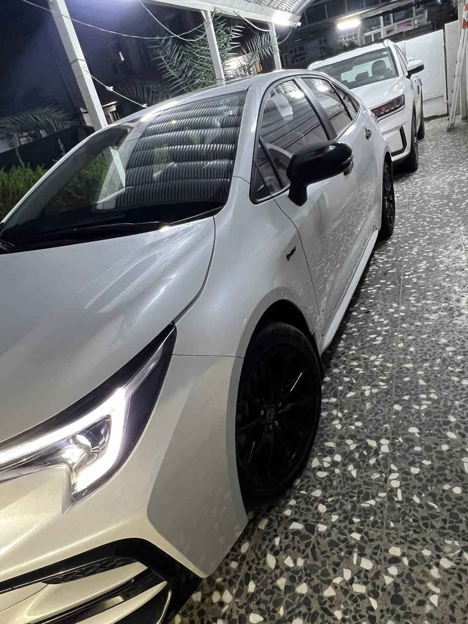 ✨🖤 ملكة 2025 (بلاك إدشن) 🖤✨
لعشاق التميز والفخامة "..كورلا هايبرد 2025 (S) ماشية (7) الالف 

💰 السعر 157$ 

⚠️ ملاحظة: مشخوطة بلرصيف مثل ما موضح بلصورة 
رقم الاتصال  ***********

⚡ المواصفات والمميزات العالمية:
• المحرك: 1800 هايبرد (قوة أداء مع أعلى توفير للوقود).
• التصميم الخارجي:
• فئة Black Edition الأصلية.
• جناح خلفي + مرايا جانبية + شعارات (سوداء ملكية).
• ويل كب أسود بلادي بتصميم رياضي.
• فتحة سقف (سلايد).
• إضاءة لايت زينون فاخرة.
• التقنيات والذكاء:
• شاشة وسطية متطورة + عداد ديجيتال بالكامل.
• كاميرا دوارة بدقة عالية.
• بصمة تشغيل + نظام الدخول الذكي.
• نظام (رادار + تحديد مسار + قيادة شبه ذاتية).
• هاند بريك كهربائي + أوتو هولد.
• الراحة والأمان:
• مقاعد جلد أصلي (تحكم كهربائي للمقعد).
• تحكم مقود كامل (جهتين) + وضعيات قيادة (Drive Mode).
• نظام أمان متكامل (فل سيستم إيرباك + مانع تصادم + مانع انزلاق).
