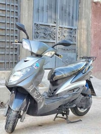 دراجه سكنس موديل 2009 دراجه كلها بلاديه ختم واحد ويا الماكينه كهربائيا...