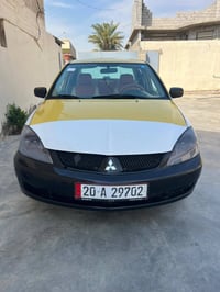 لانسر 2010 رقم ديالى دولي محرك 1500 كير عادي سياره جاهزه السعر 57 وبيه...