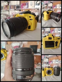 نيكون D7100 • عدسة 18-140 • بطاريتين