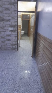 دار للبيع في حي البساتين شارع احمد الوائلي فرع قصابة ومشويات الموسوي ا...