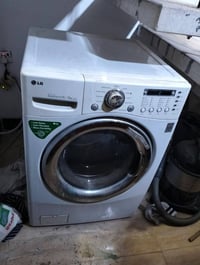 غسالة ملابس • زيونه