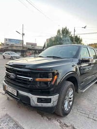 2024 فورد f150 هايبرد فئة xlt   فول حلوة مواصفات  ماشيه ١٢ الف محرك كي...