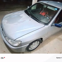 ٢٠٠٢ • رصاصي • گيرو ومحرك بكفالة