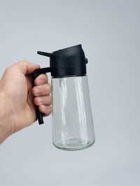 مزيتة زجاجية • تصميم مميز • توصيل محافظات