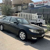 كامري موديل 2006وارد امريكي فول فتحه مانع انزلاق كشن كهرباء سنويه باسم...