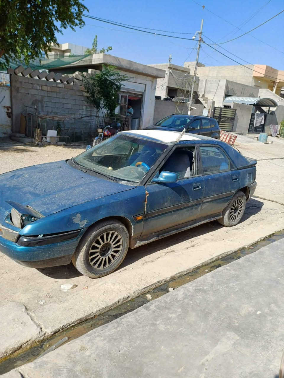 مازدا ٣٢٣للبيع رقم كركوك مشروع بي بطاقة بنزين السعر٢٥ رقم الهاتف ***********
