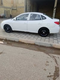 ماكينة ١٦٠٠ • دواخل عسلي جلد • رقم اربيل