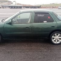 مازدا ٣٢٣ • ١٦ صباب • كويسينجاك