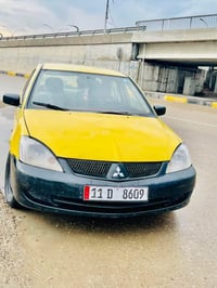 لانسر 2010 • محرك 2000 • رقم بغداد