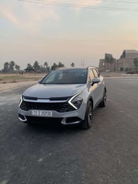 كيا سبورتج 2024 SX ((للبيع)) لون اسمنتي (مميز ) مرقم بأسمي  المواصفات ...