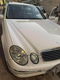 مرسيدس 211موديل 2004 ستيشن گصتها بس قماره محرك وگير بوضع ممتاز ماناقصه...