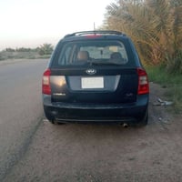 كيا كارنز لبيع موديل 2007  وارد خليجي اربعه سلندر تبريد شغال قطعتين كي...