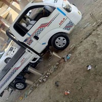 كيا ١٨رقم واسط بيها صبغ ربع  باب سائق وبالتكمةشوية جاهزه مكينة كير تخم...