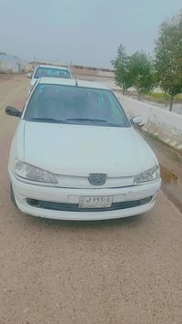 بيجو ٣٠٦ ابيض ٢٠٠١ رقم بغداد باسمي رقم الماني سنويه ماساقطة  مكينه كير...