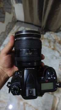 كاميرا نيكون D7000 مع عدسه 24 120 نانو كرستال واگعه العدسه وواگفه لاتق...