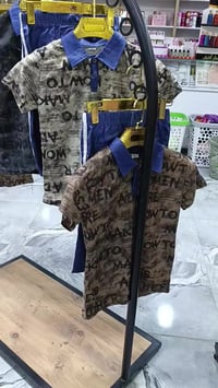 نجف الميلاد • ملابس أطفال • ملابس نسائية