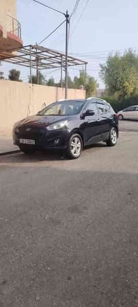 للبيع توسان ٢٠١٢ اسود السعر ١٢٥$ 07721155377