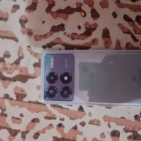 موبايل POCO X6 Pro 5Gويا كارتونه وشاحنه للبيع السعر250اني مكلف بنشر حب...