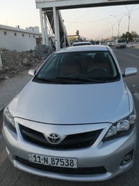 سيارة كورلا موديل ٢٠٠٩ محرك ١٨٠٠ مصبوغه عام وارد أمريكي بيها قطعة البن...