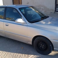 اكسنت افيرنه موديل 2001  مصبوغة عام بدون ضربة محرك 1600 رقم بغداد انكل...