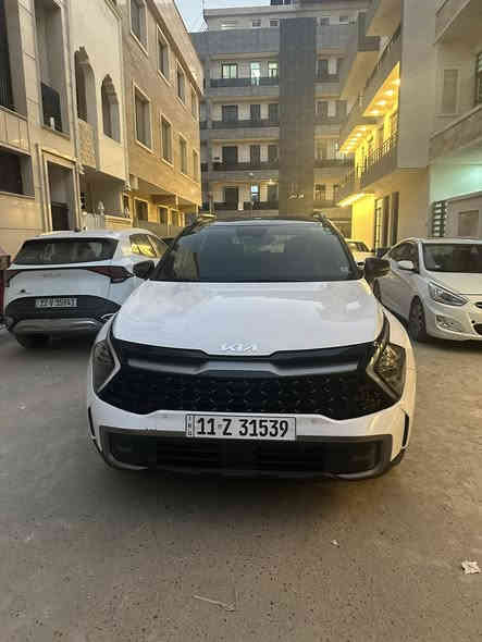 السلام عليكم 
كيا سبورتج 2024 x pro 

اعلى فئة بالسبورتج تجي ارتفاع اعلى من العادي  وحجم اكبر 

Two color لونين 

عليها تايرات Bf goodrich اصلي من الشركة

فول مواصفات 1/1

سقف بانوراما + فتحة 

محرك 2500 

كير 8 نمر 

رادارت امامي خلفي جانبي 

كامرات 4

سستم سماعات harman kardon

شاشه متصله 

كشنات تدفئة + تبريد 

خزن ميموري  + جلد 

وبعد هواي مواصفات بيهة 

اللون ابيض + اسود 

صندوك كهرباء 

وارد امريكي حادث امامي سطحي 

مبدل بنيد اصلي اصلي فقط والجاملغات بيهن بارد  مثل ماموضح بالتقرير مكفولة من اللغود والشواصي  

رقم بغداد تحويل مباشر 

ماشية 50,000 km  يعني بالميل 31,000 miles 

السعر : 23,000$ 

العنوان:  بغداد الاعظمية

***********
