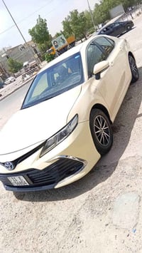 كامري موديل 2022 هايبرد خليجيه 🔥🔥 رقم بغداد بأسمي تحويل ثاني يوم  سيار...