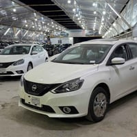 نيسان سنترا موديل 25 رقم بغداد باسمي سياره جديده مقفوله ماشيه 8000 الف...