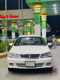 نيسان سني ياباني اصلي موديل 2002 يسرا بلادي محرك 1800 قباق اسود المرغو...
