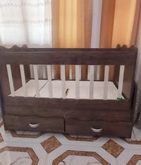 سرير طفل هزاز • ناصرية حي الشهداء