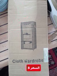 خزانة ملابس قماشية (Cloth Wardrobe) محمولة وقابلة للطي، وهي مصممة لتنظ...