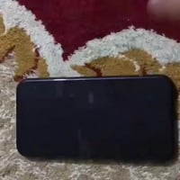 ايفون اكس ار ذاكرة 64 كولة شغال 100‎%‎ ما بي خلل عدا قاعدة الشحن الة ت...