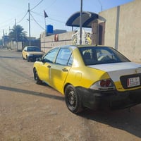 السلا عليكم لانسر 2010 للبيع محرك كير خير من الله  محرك 2000 رقم انكلي...