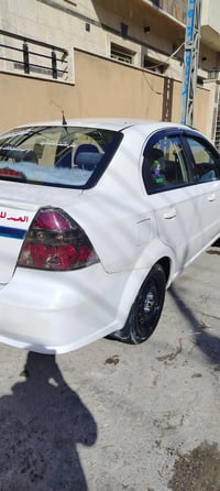 أفيو وارد أمريكي 2010 ضررها جاملغ يمين امامي ومبدل جديد ،،سيارة جاهزة ...