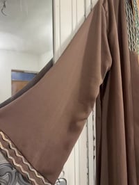 مقاس ٤٨ • ملابس