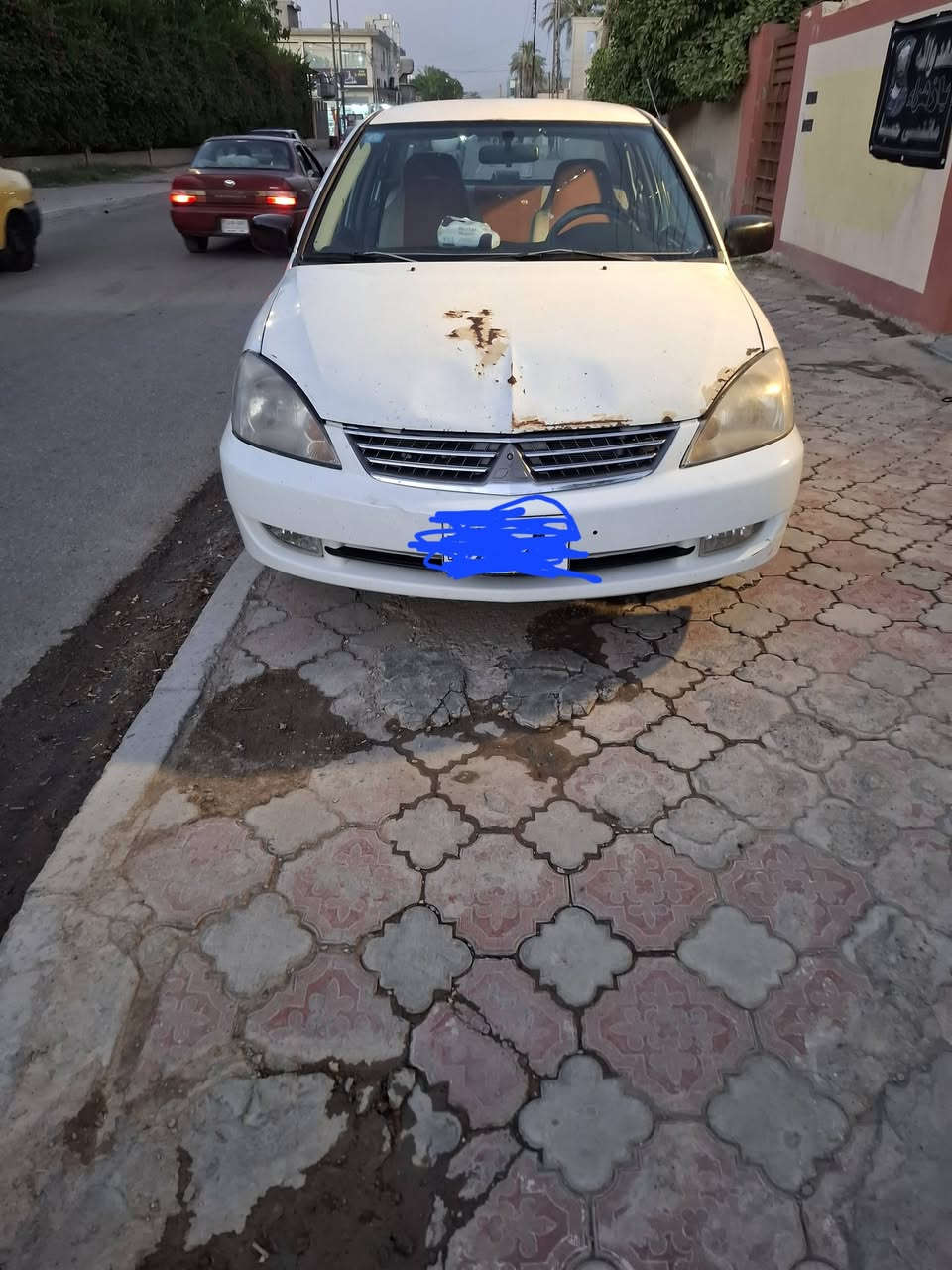 السلام عليكم لانسر  ٢٠٠٦ وارد خليجي مابيهة ضرر بس خياس مسوي رقم بغداد    مميز ٤ ارقام مكينه 2000 جديده اتصال على رقم صاحب السياره  ***********
