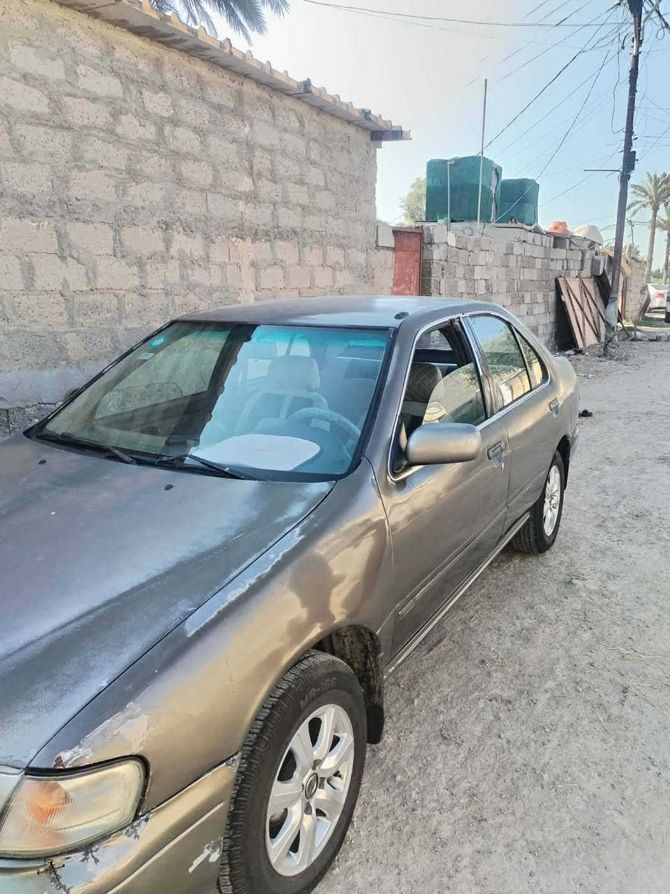 سلام عليكم 
 نيسان نضيفه دواخل جديد كير مكينه مكفولات بس تحويل ثاني يوم تأيرات جدد رقم بغداد انكليزي تبريد بارد بس منقص غاز قليل حجم لمكينه 1800 لسعر 40.وبيها مجال
***********
