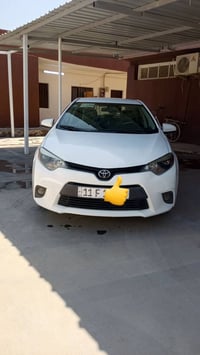 تيوتا كورلا ٢٠١٤ امريكي بيها قطعتين بدون دواخل 07906832988 سعر 120