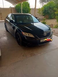 كامري  2009  وارد امريكي  السيارة جاهزة  من كلشي  رقم بغداد  كير ومحرك...