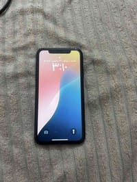 آيفون XR • نجف • صور