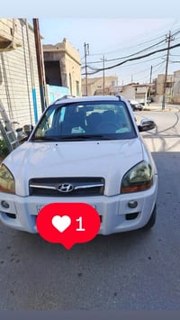 توكسون 2009 بدون ضرر بدون صبغ  ماشية 260 كيلو  سيارة جديدة بدون اي ملح...