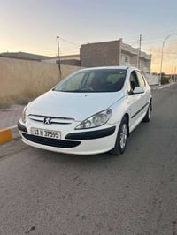 بيجو 307 • ٢٠٠٤ • انكليزي