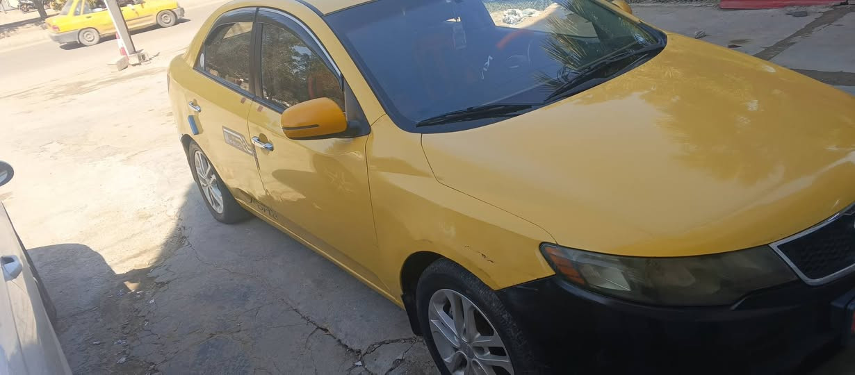 كيا فورتي موديل 2012 حزام وباب السايق مصبوغ ماشية 300الف وشوية السعر 75 وبيها مجال 
***********
