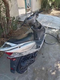 كامكو V1 • موديل 2009 • مكينة 125