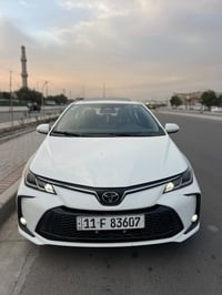 كورلا هايبرد موديل 2025 ماشية 11الف رقم بغداد باسمي السيارة موضح الضرب...