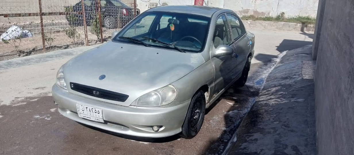 كيا ريو موديل 2000 رقم بغداد مشروع وطني بسمي. محرك كير  جدد  كهربائيات كله شغاله تبريد نقصه بس غاز باتري جديد السعر 35.  رقم الهاتف ***********

