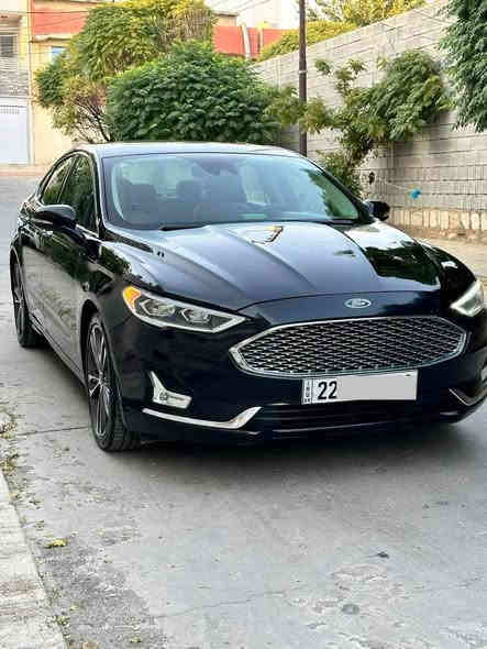 فورد فيوجن  تيتانيوم 1/1 موديل 2019 مكينه 2000 تيربو 
ماشية 97 الف ميل
مواصفات 
رادار امامي خلفي 
حساسات 
كاميرا
سلايد 
كشنات كهرباء الجهتين وخزن وتبريد وتدفئه 
اناره داخليه 7 الوان 
تبريد قطعتين 
تحديد مسار 
تشغيل عن بعد 
دخول ذكي بدون مفتاح وترحيب 
شاشة كبيره تدعم كار بلي 
رقم اربيل باسمي 

عنوان السيارة بغداد
***********
 حادثها فقط دعامية خلفية 

السعر واتساب 

ملاحظه مهمه ( السياره تيتانيوم ) يعني فول الفول 
جماعة ال 130 وال140 وال 150 لتراسلوني رجاءآ
