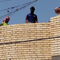 النجف • خلفه بناء