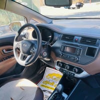 كيا ريو 2012  بدون صبغ بدون ضرر سنويه وهزه جديده كابون بانزين محرك وكي...